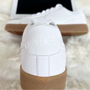 Classic White Nike Sneakers with Brown Sole